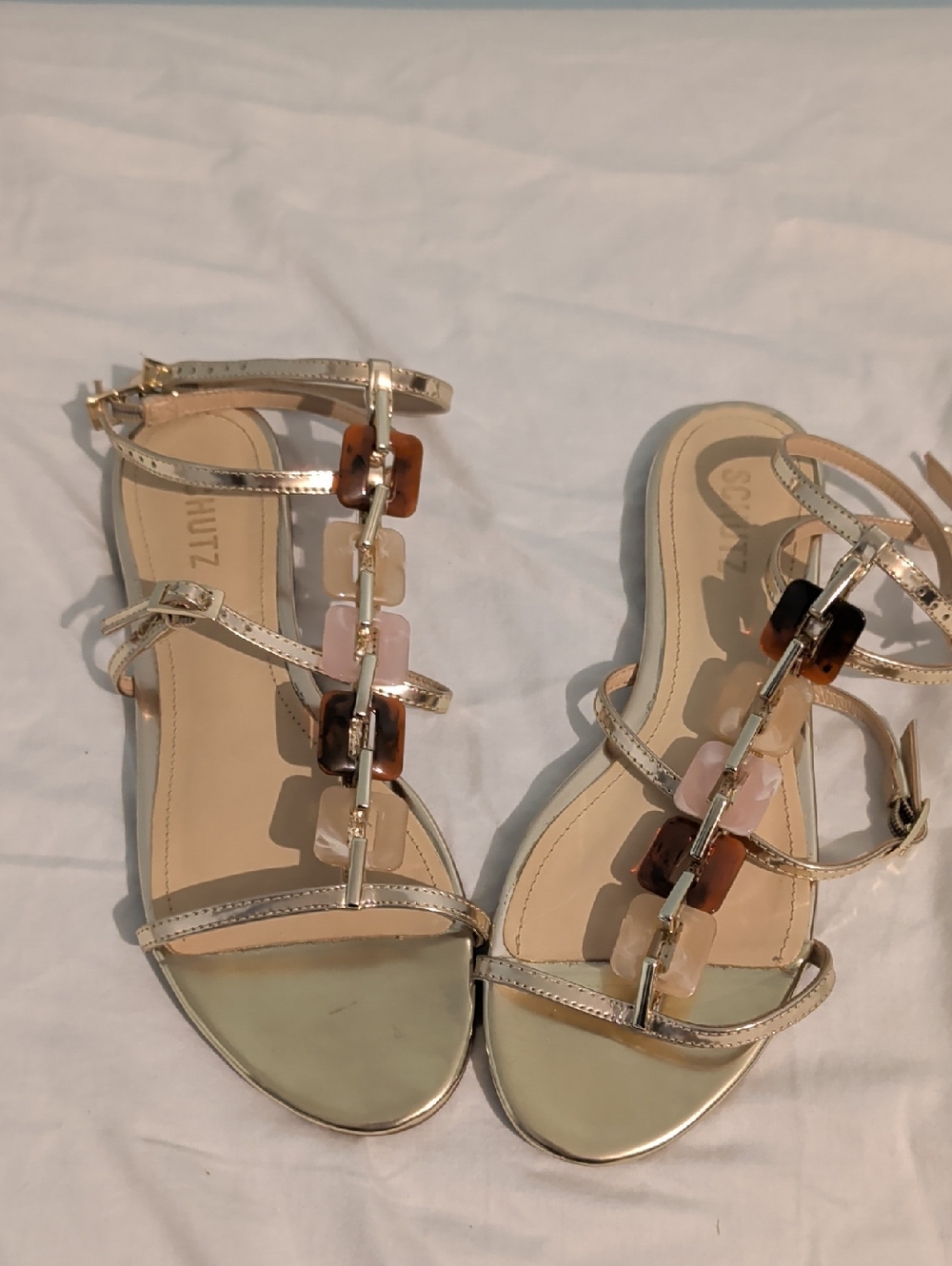 SCHUTZ Metallic Gold T-Strap Sandals with Tortoiseshell and Blush Links
